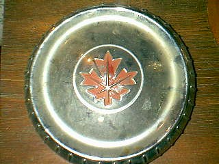 '60 Frontenac hubcap, with Maple Leaf