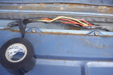 Tailgate wiring harness jacket damage